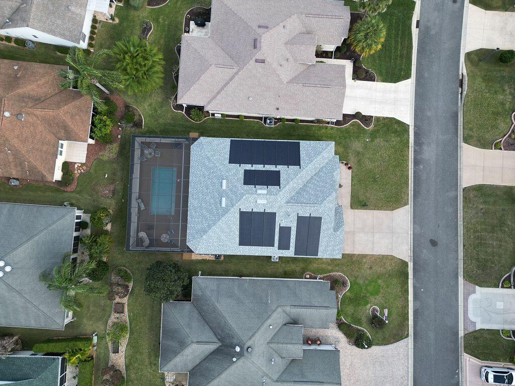 roofing jacksonville-arial view of a home with new gray roofing