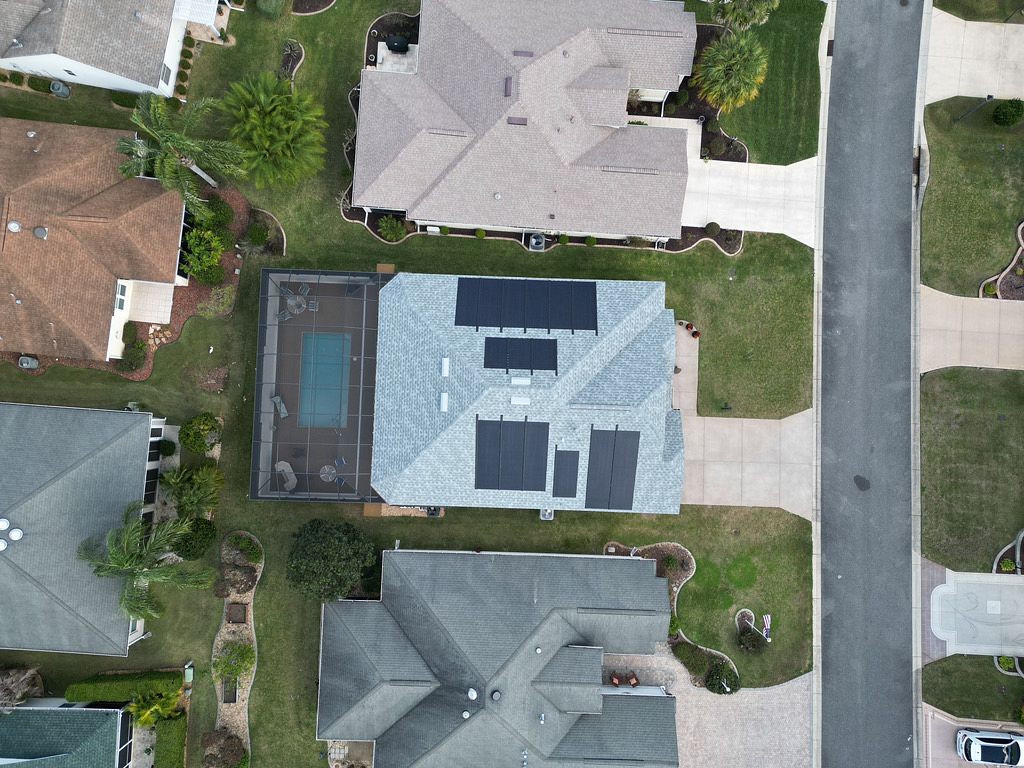 roofing sarasota-arial view of a home with new gray roofing