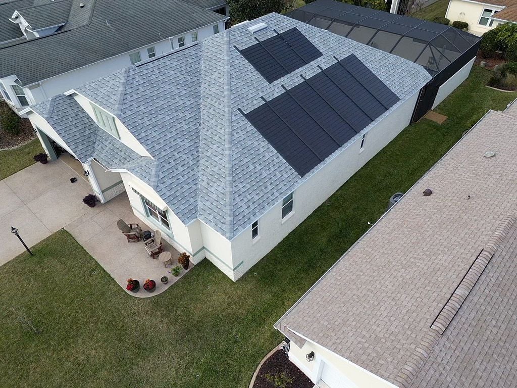 roofing venice-new gray shingles on a white home
