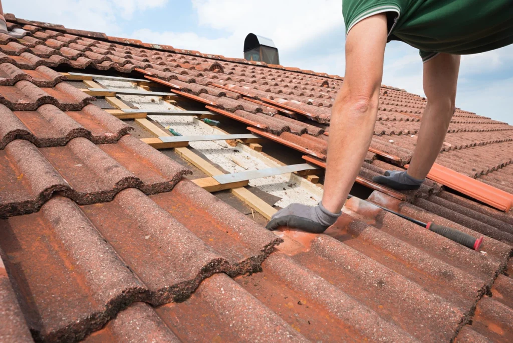 repairing tile roof home