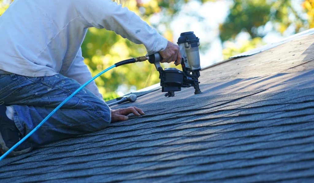 installing new shingles on roof