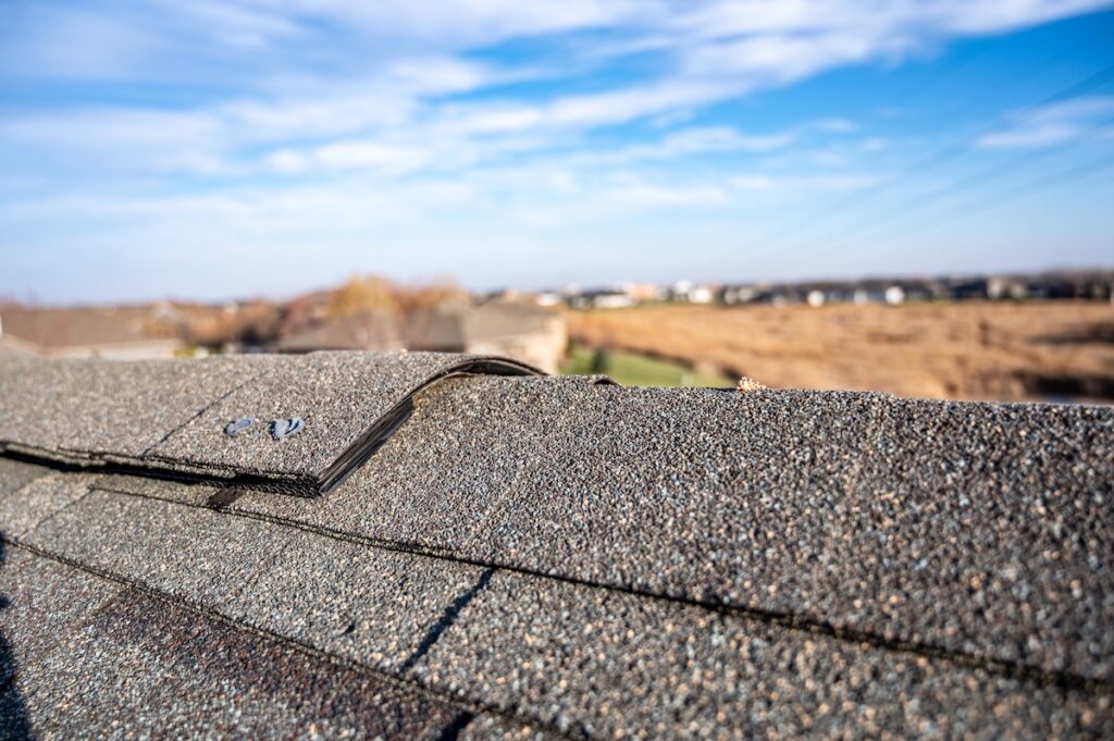Typical residentail ridge cap on a shingle roof apex