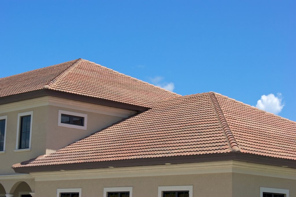 clay tile roof tops in florida against clear blue sky roof styles