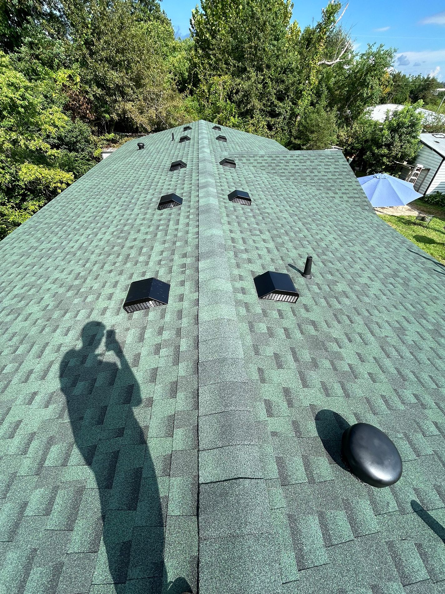 Hunter Green GAF Timberline HDZ architectural shingle roof installed on a home in Bonifay, Florida