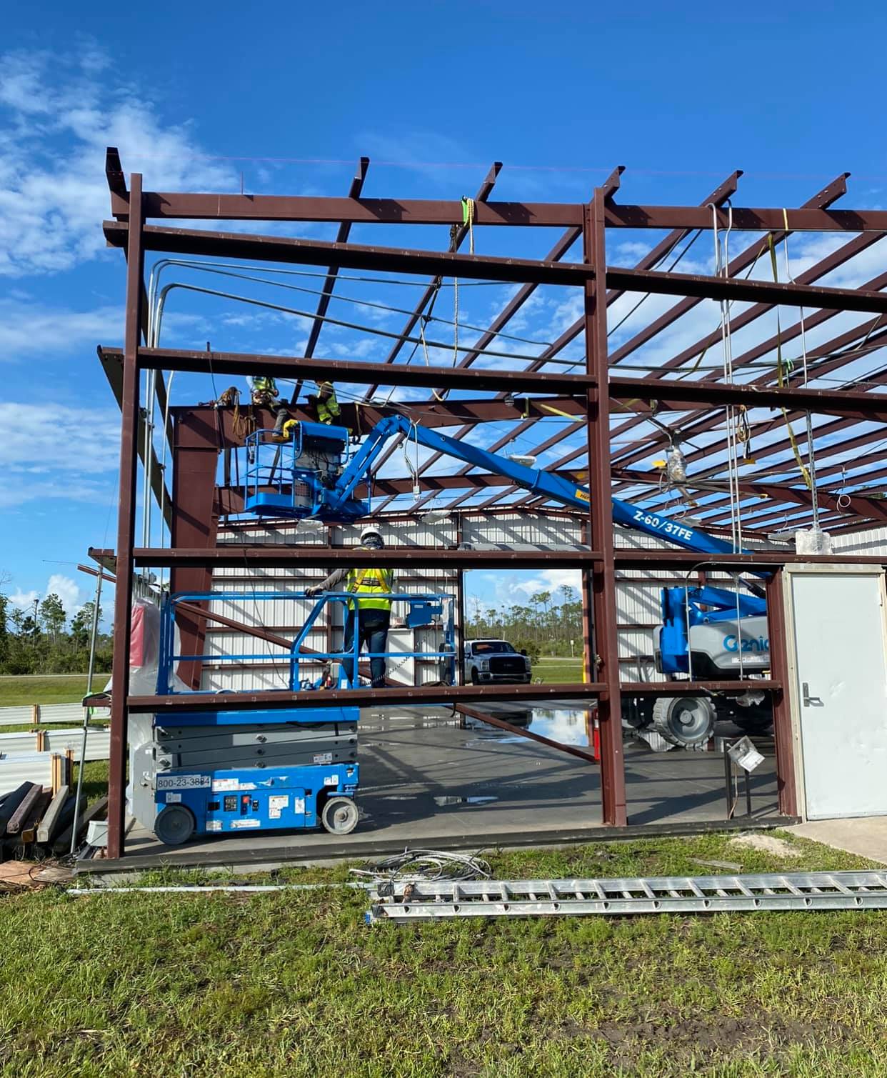 Exterior installation work in progress on a new commercial construction building in Florida