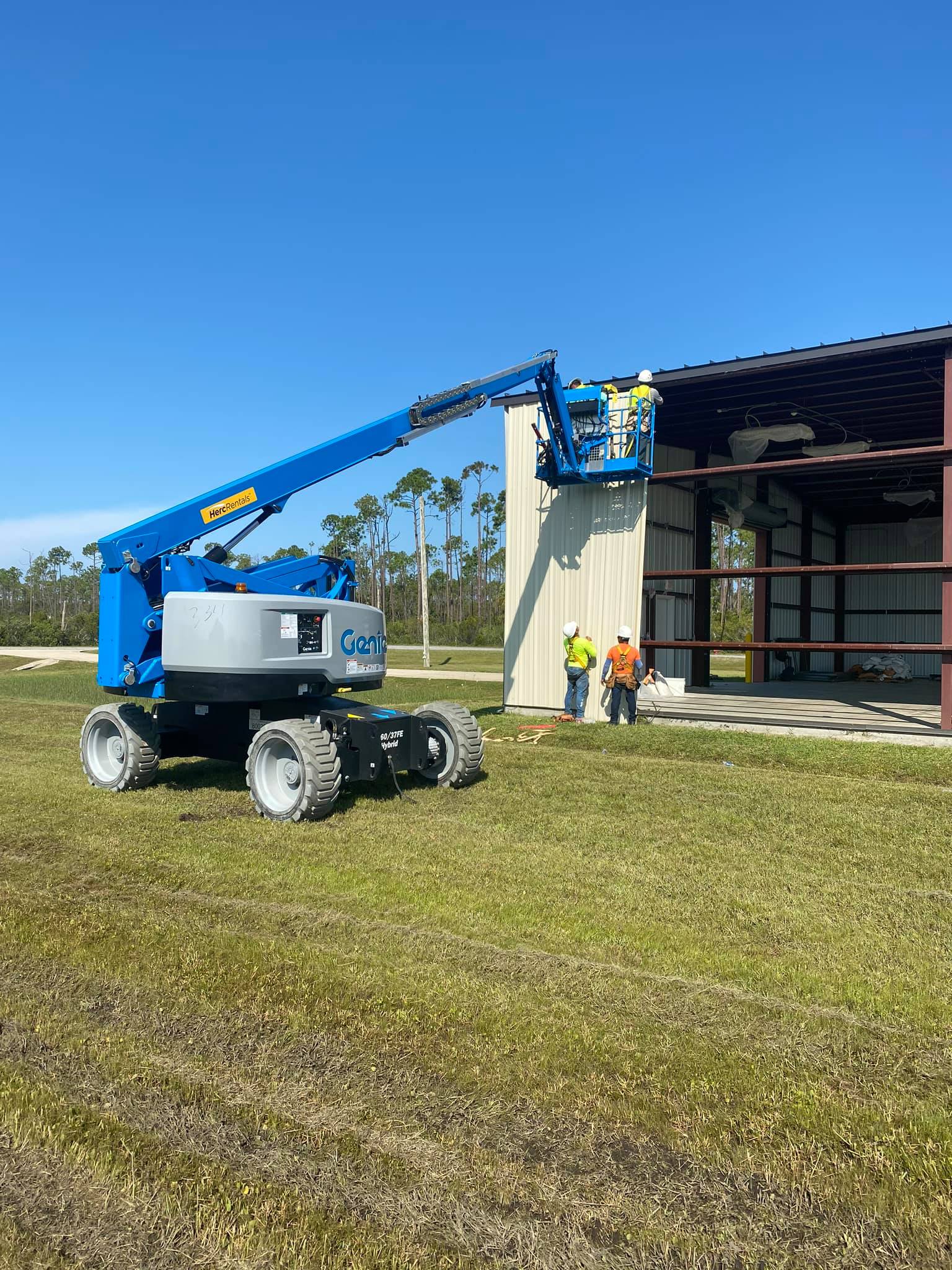 Professional metal siding installation on a commercial building in Florida