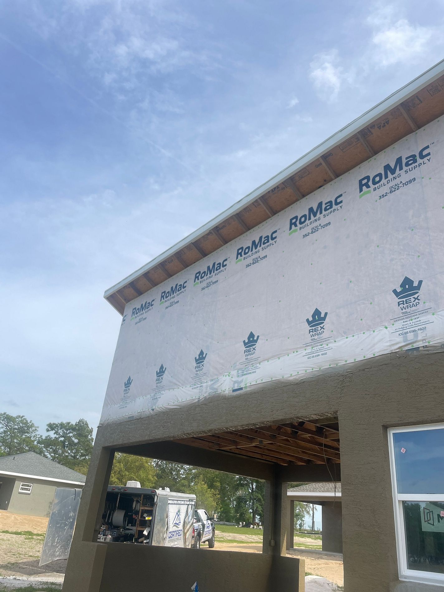 Exterior wall sheathing and trim repair in progress on a Florida home