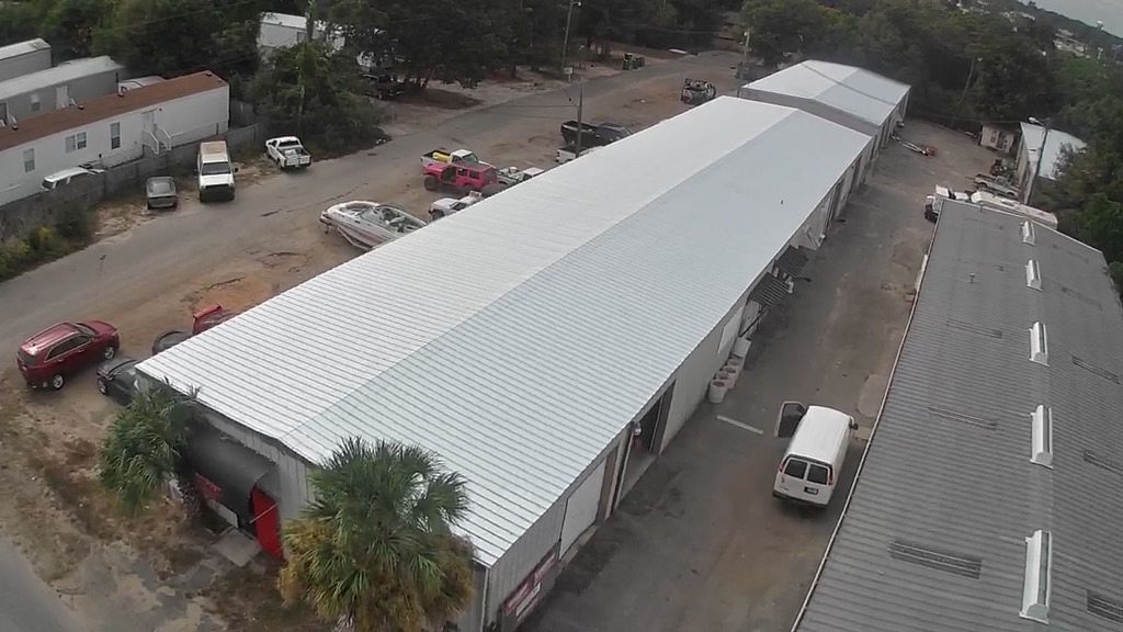 White standing seam metal commercial roof installed in Fort Walton Beach, Florida