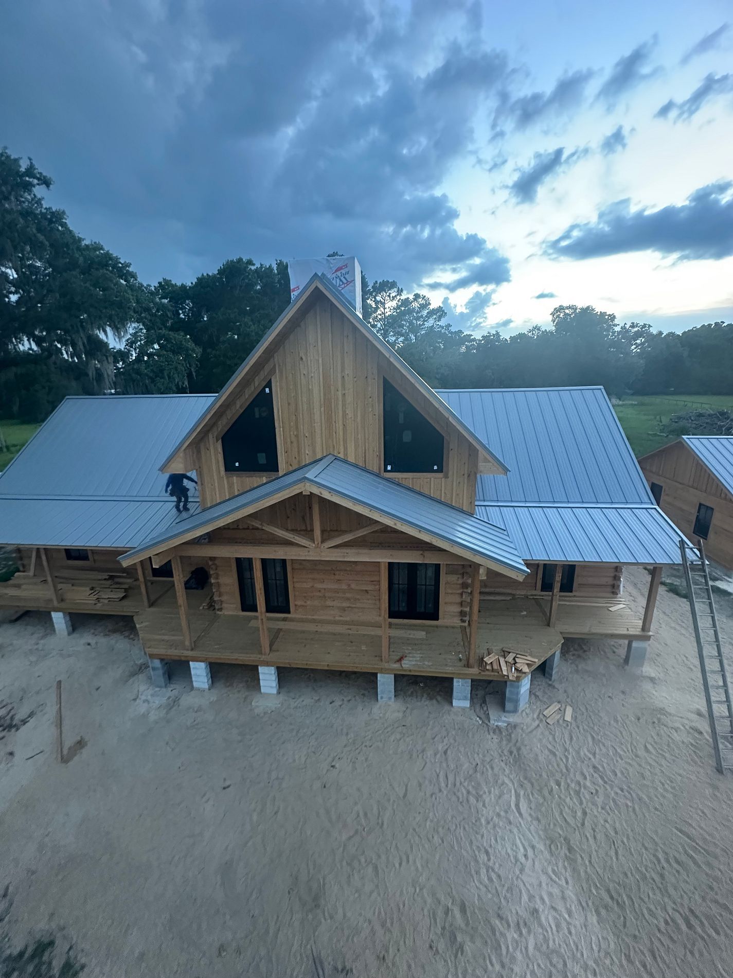 26-gauge Galvalume standing seam metal roof installed on a new construction home in Reddick, Florida