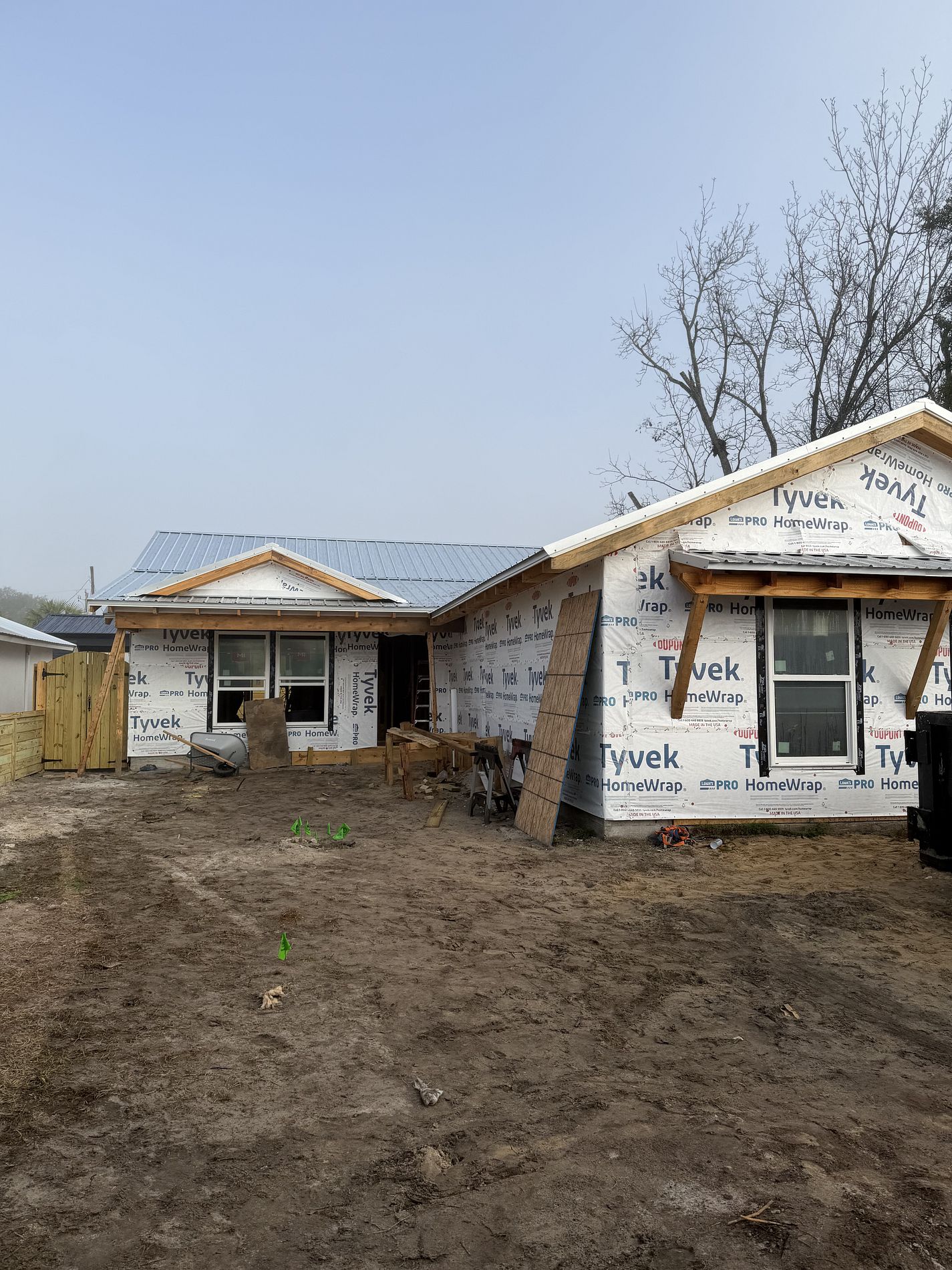 26-gauge Galvalume standing seam metal roof installed on a new construction home in Florida