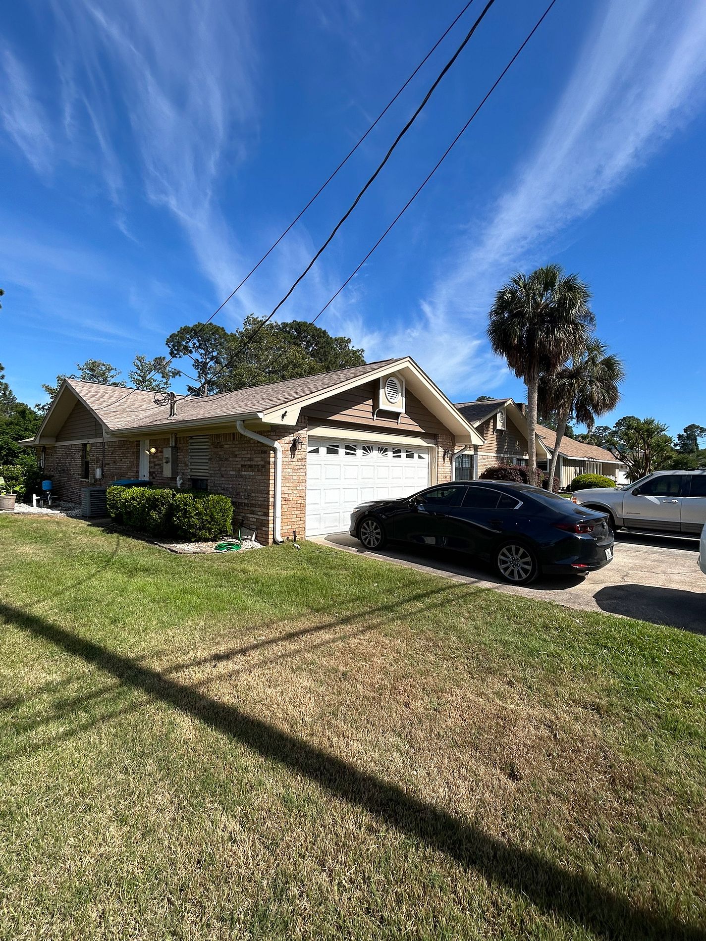 Brown architectural shingle roof replacement on a residential home in Panama City, Florida