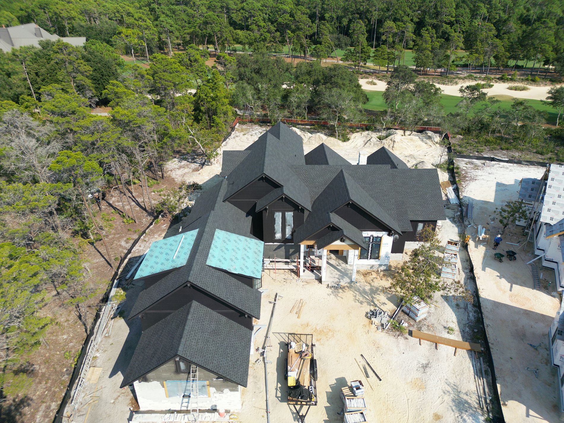Aerial view of a GAF Timberline HDZ architectural shingle roof installed on a new construction home in Ocala, Florida