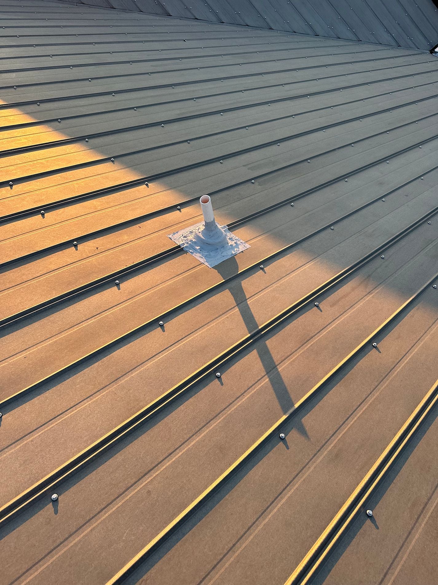 exposed fastener metal roofing system installed on a Florida property