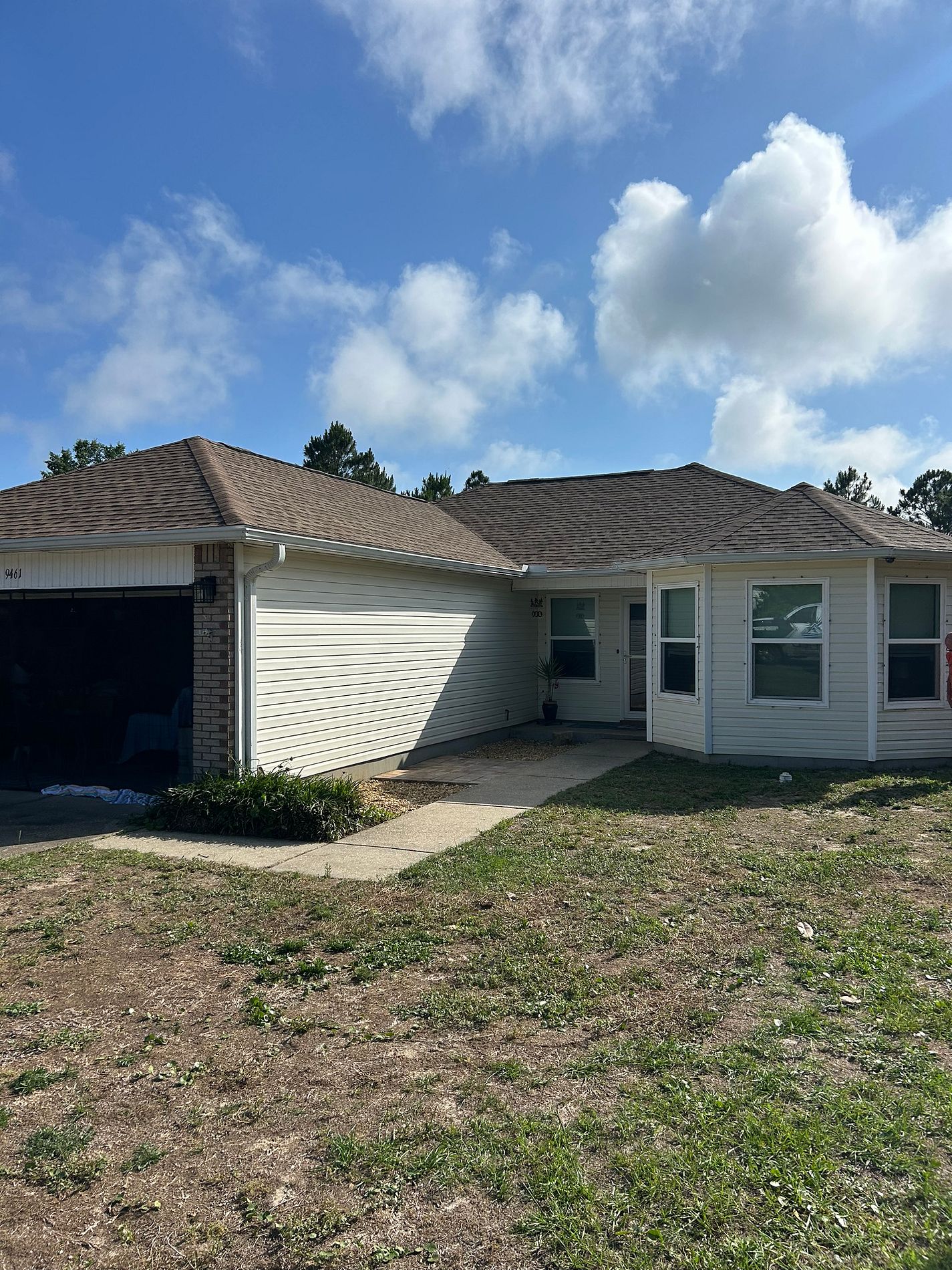 Driftwood GAF Timberline HDZ architectural shingle roof installed on a residential home in Pace, Florida