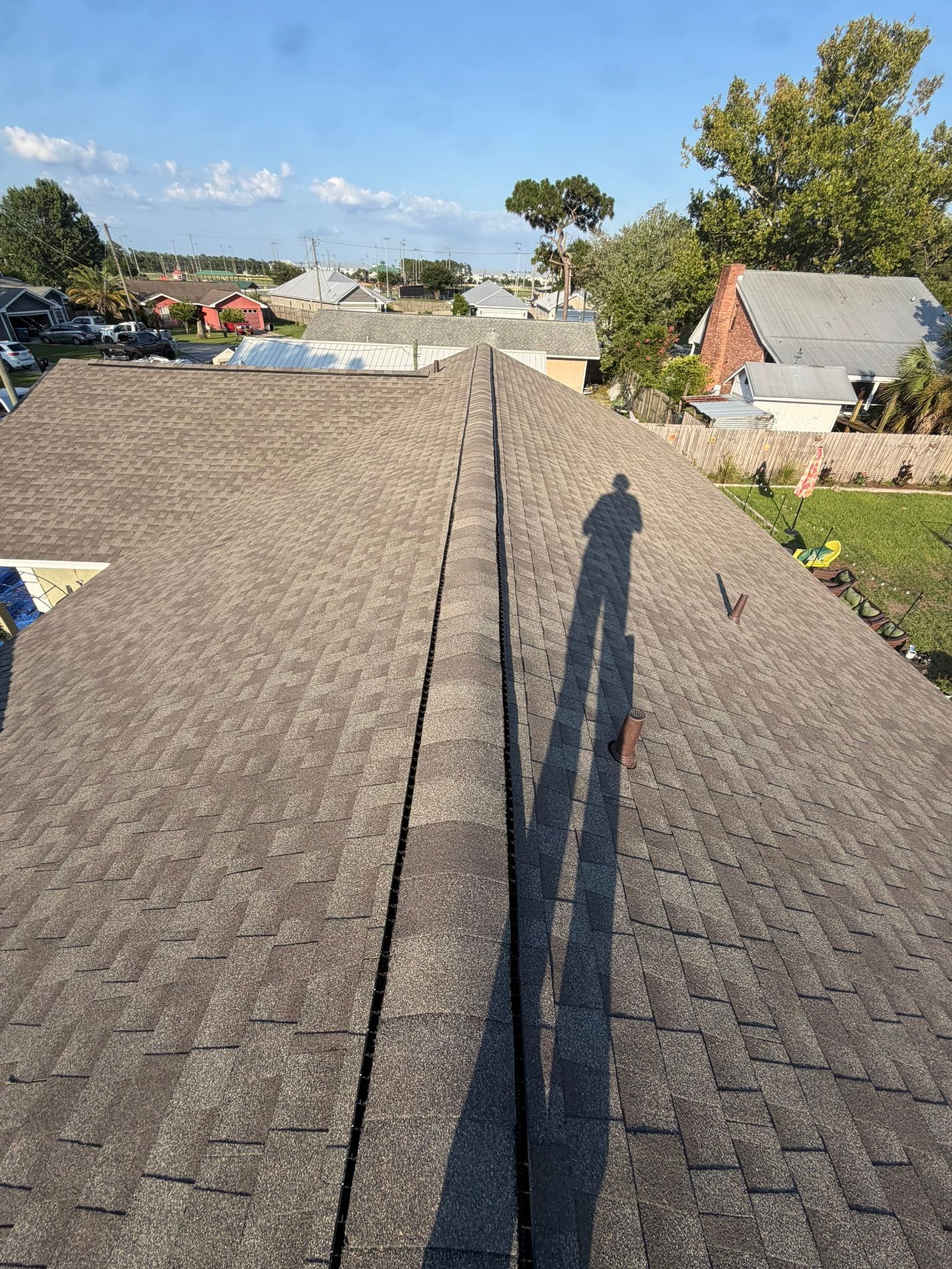 Weathered Wood GAF Timberline HDZ architectural shingle roof installed on a home in Blountstown, Florida