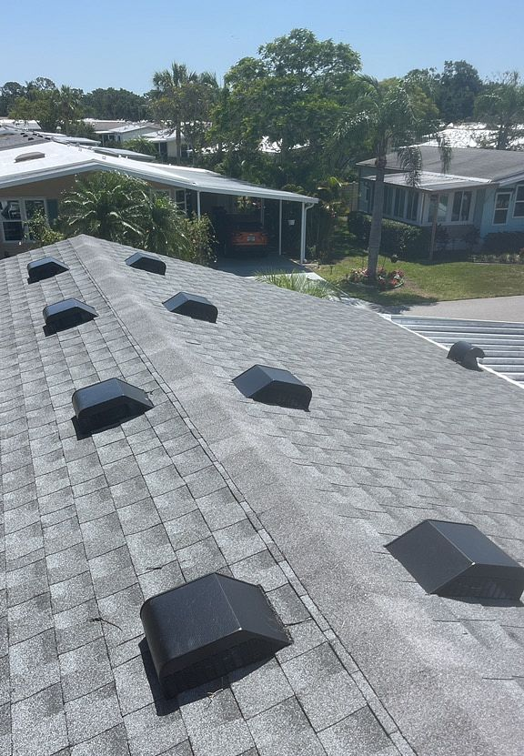 Oyster Gray GAF Timberline HDZ architectural shingle roof installed on a home in Arcadia, Florida