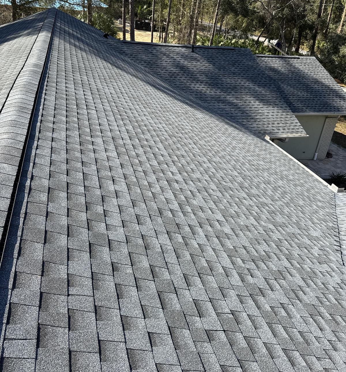 Oyster Gray GAF Timberline HDZ architectural shingle roof installed on a home in Starke, Florida