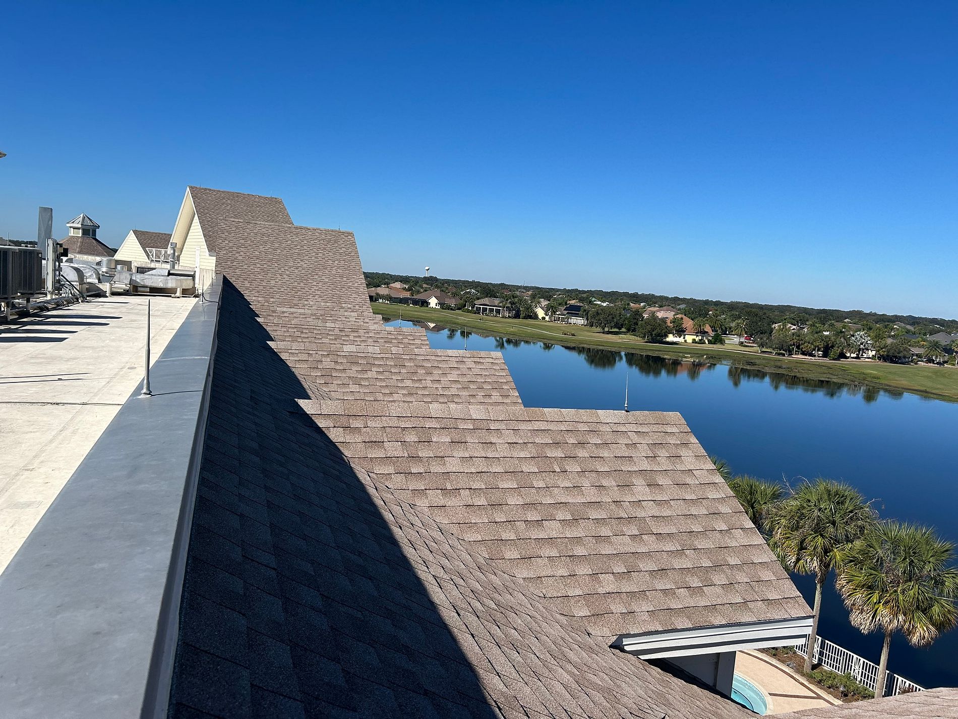 A complete GAF Timberline architectural shingle roof replacement completed at Waterfront Inn in The Villages, providing dependable weather protection, improved curb appeal, and lasting commercial performance.