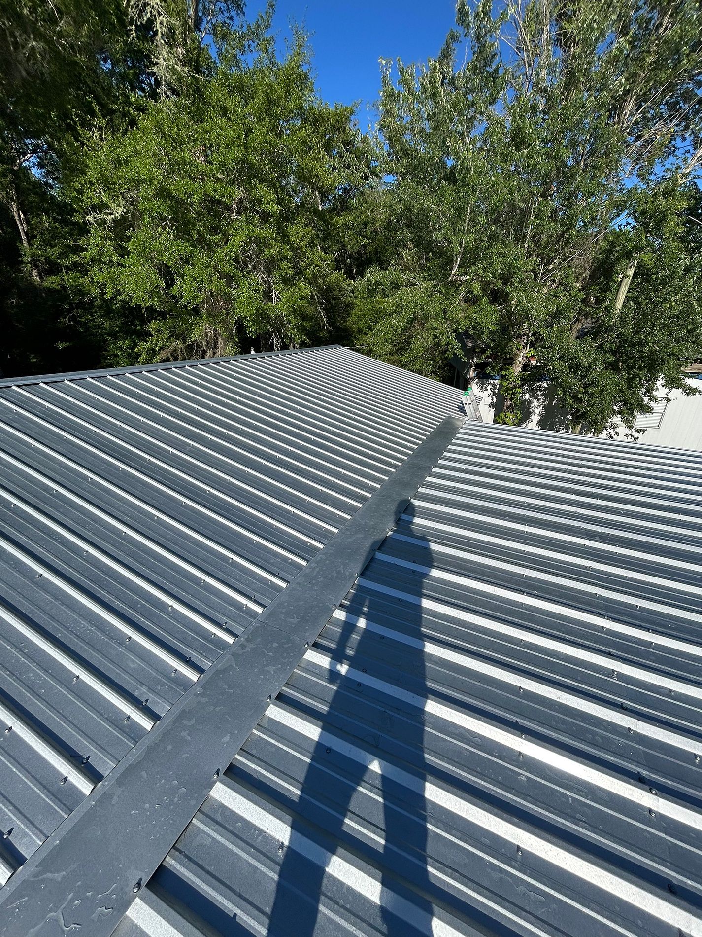 Galvalume exposed-fastener metal roof installed on a property in Port St. Joe, Florida