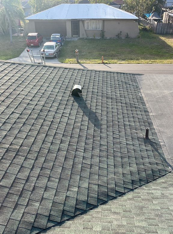 Hunter Green GAF Timberline HDZ architectural shingle roof installed on a home in Brandon, Florida
