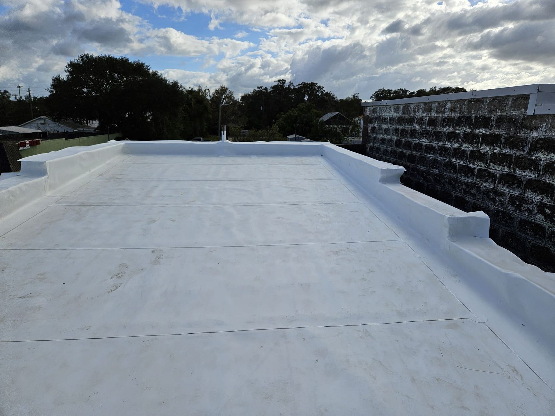 GAF EverGuard TPO roofing system installed on a commercial property in Palm Coast, Florida
