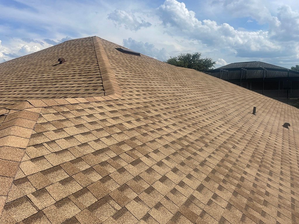 Shakewood GAF Timberline HDZ architectural shingle roof installed on a home in Clermont, Florida
