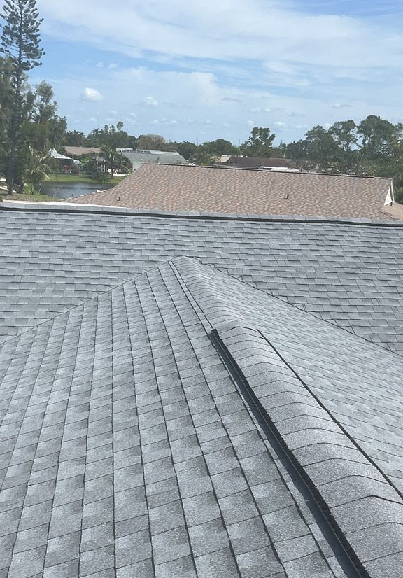 Oyster Gray GAF Timberline HDZ architectural shingle roofing system installed in Fort Myers, Florida