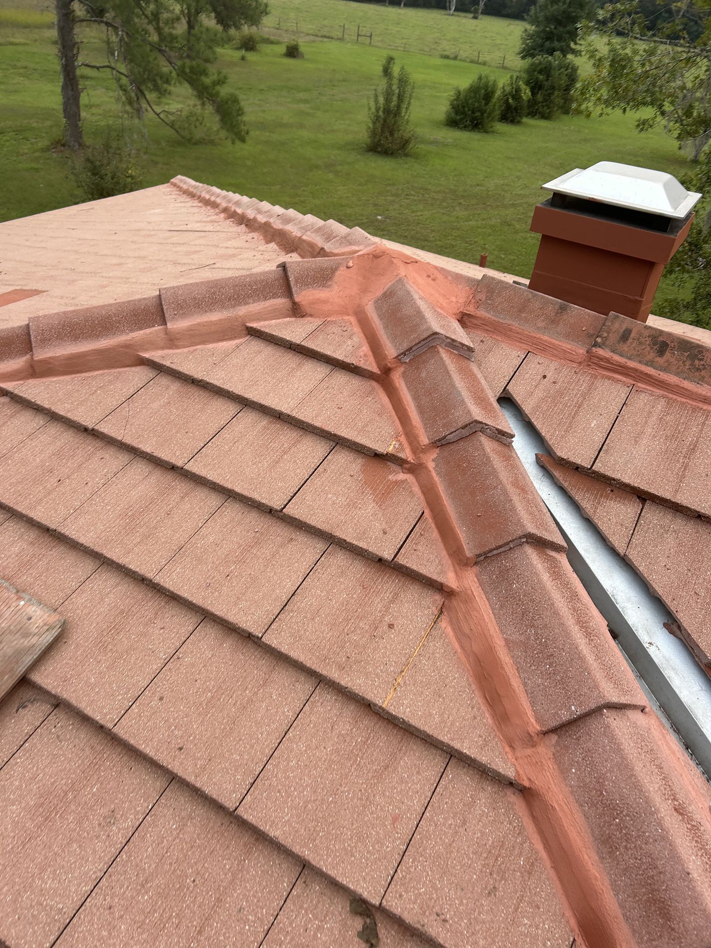 Red slate roofing system installed on a property in Lake Butler, Florida