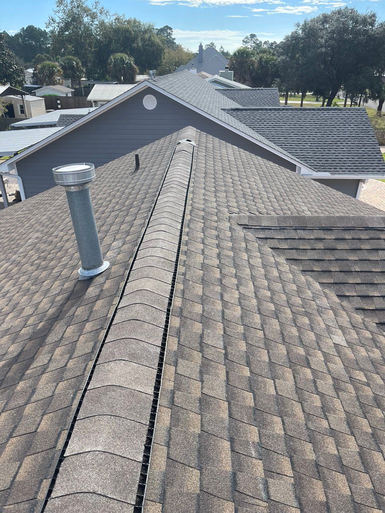 Barkwood GAF Timberline HDZ architectural shingle roof installed on a home in Port St. Joe, Florida