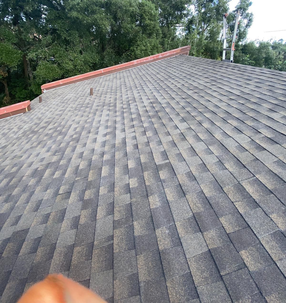 Barkwood GAF Timberline HDZ architectural shingle roof installed on a home in DeLand, Florida