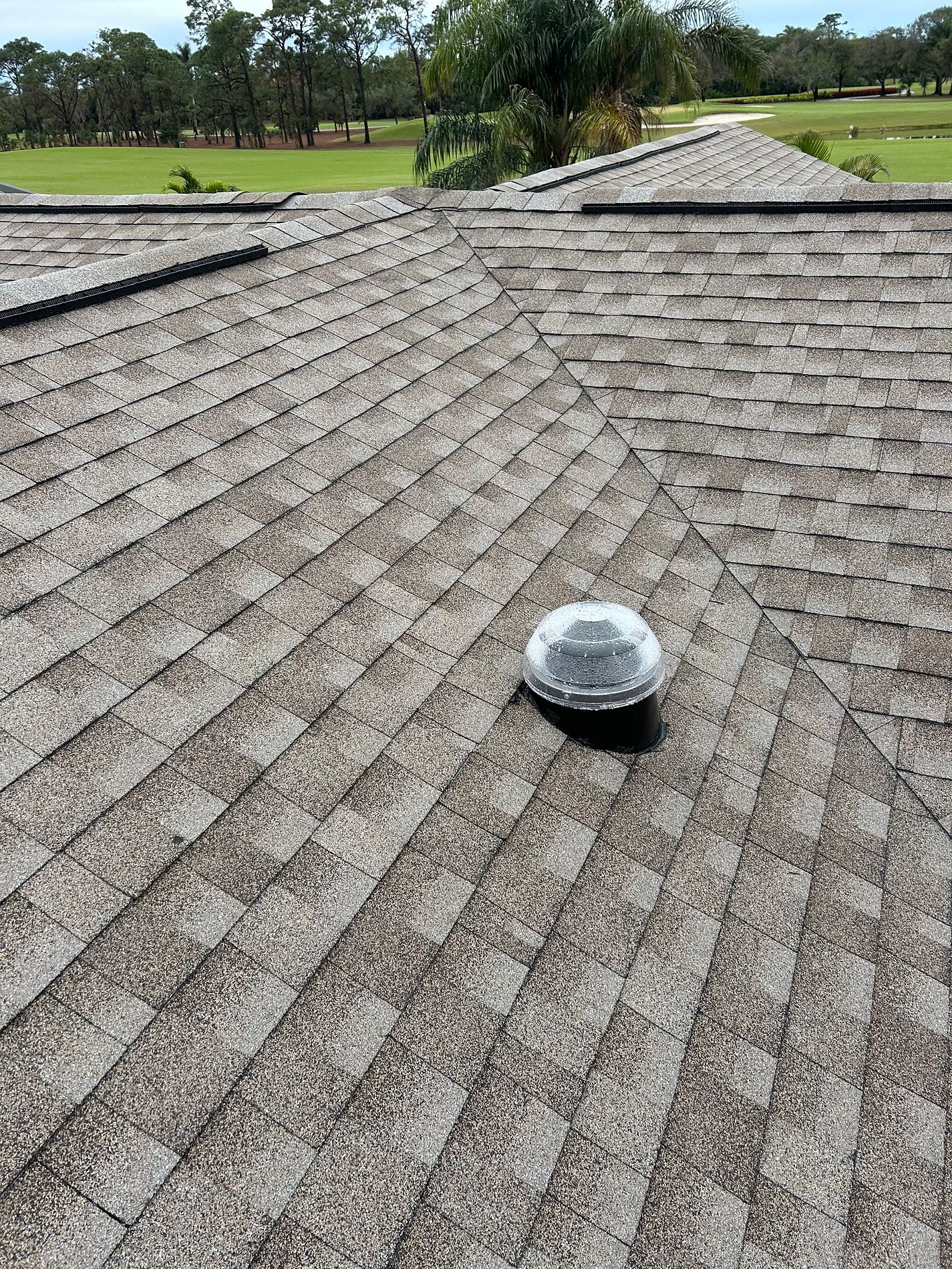 Driftwood GAF Timberline HDZ architectural shingle roof installed on a home in Naples, Florida