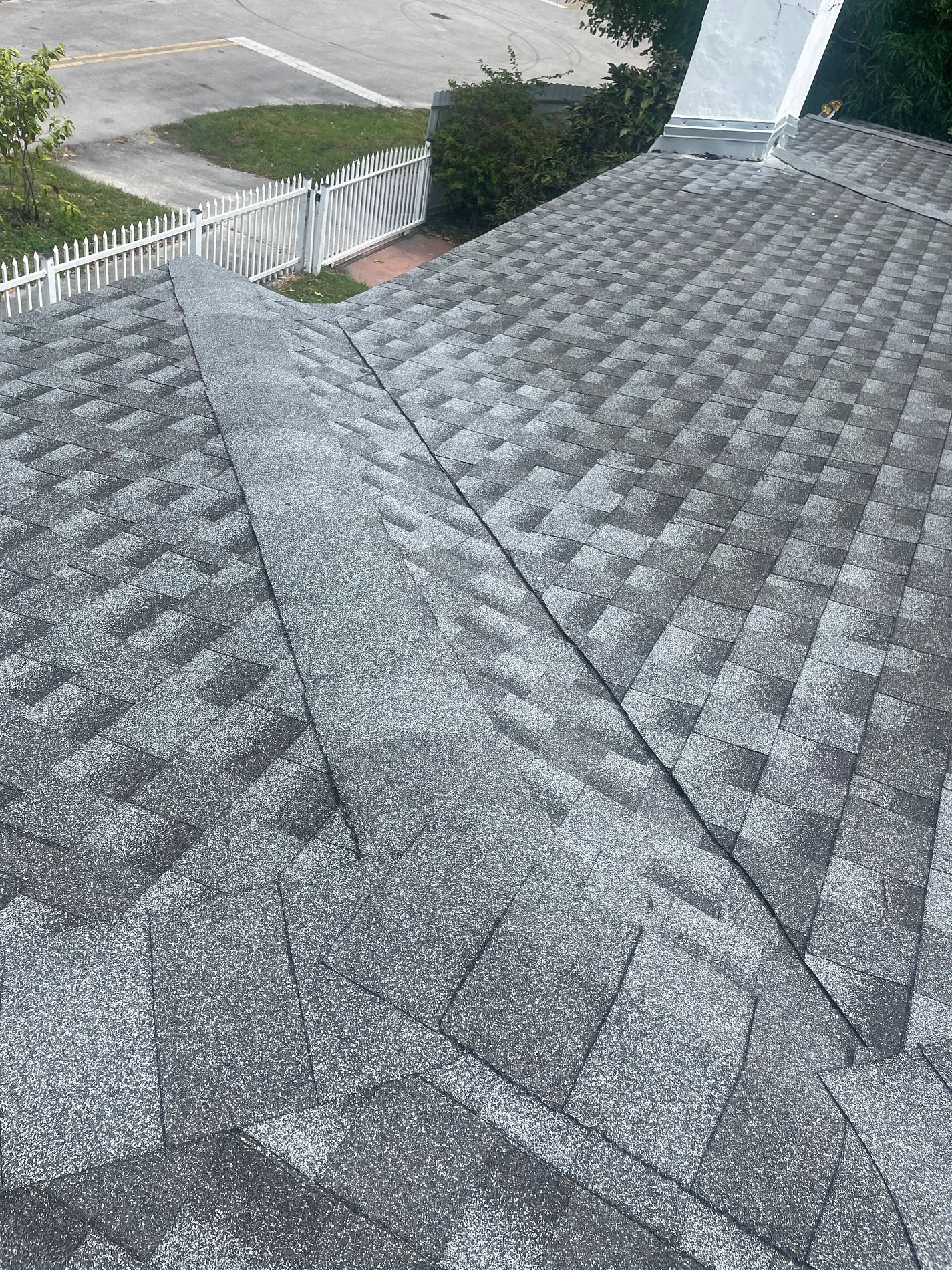 Oyster Gray GAF Timberline HDZ architectural shingle roof installed on a residential property in Miami, Florida