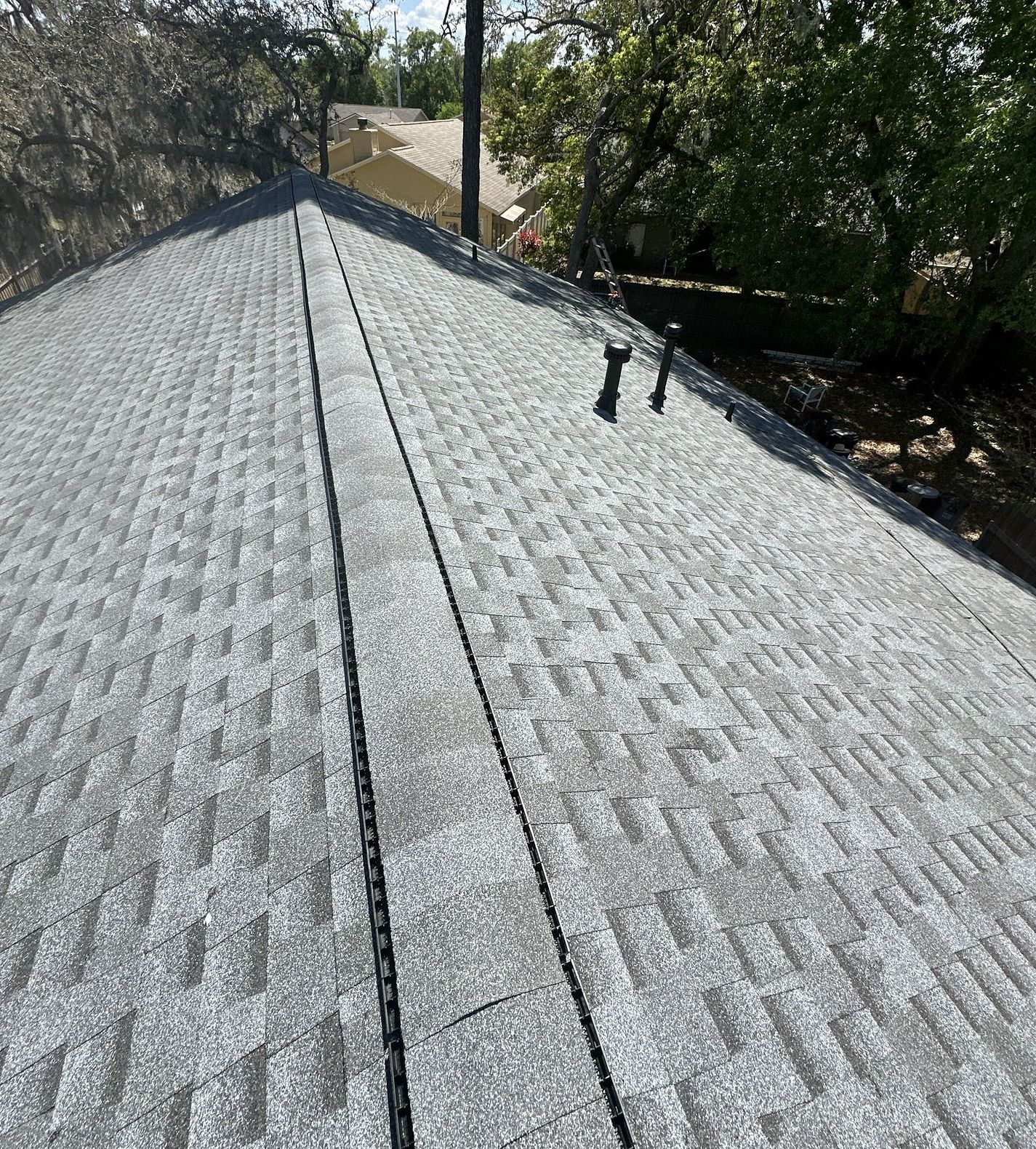 Pewter Gray GAF Timberline HDZ architectural shingle roof installed on a home in Lake Mary, Florida