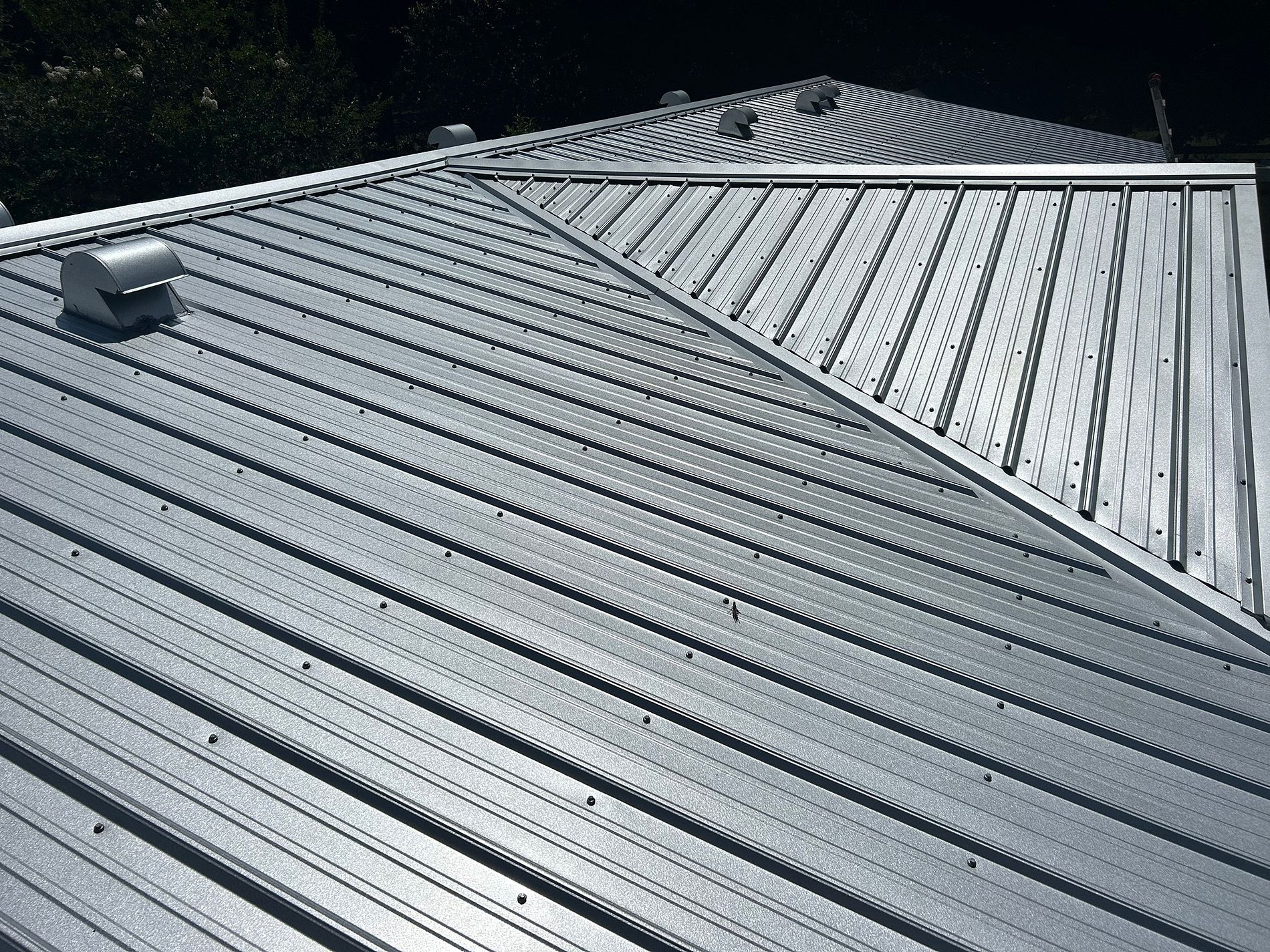 Galvalume exposed-fastener metal roof installed on a property in Steinhatchee, Florida