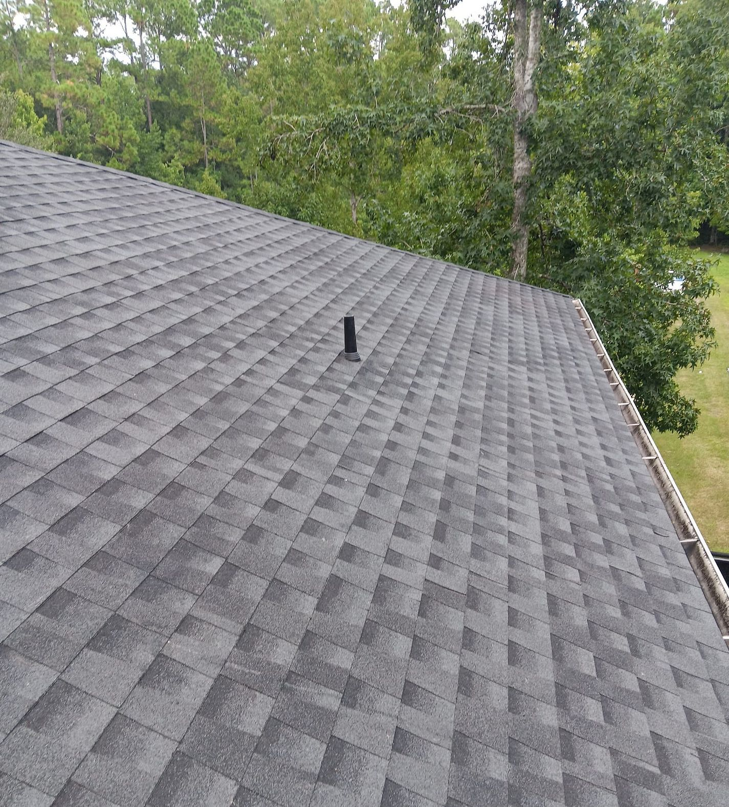 Charcoal GAF Timberline HDZ architectural shingle roof installed on a home in St. Augustine Shores, Florida