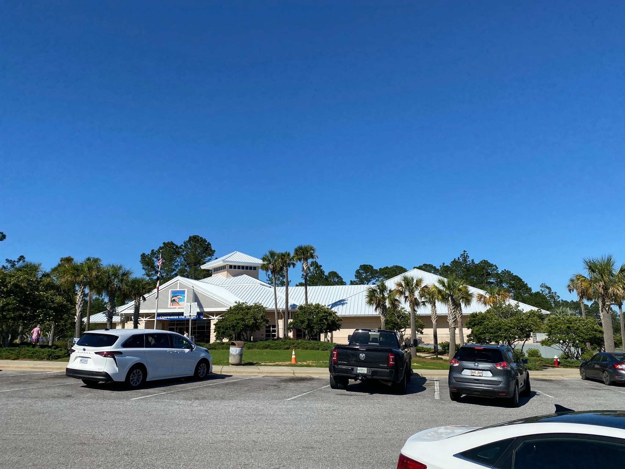 Complete 24-gauge Megaloc standing seam metal roof installation on the Florida Visitor Center along I-10 in Pensacola, FL.