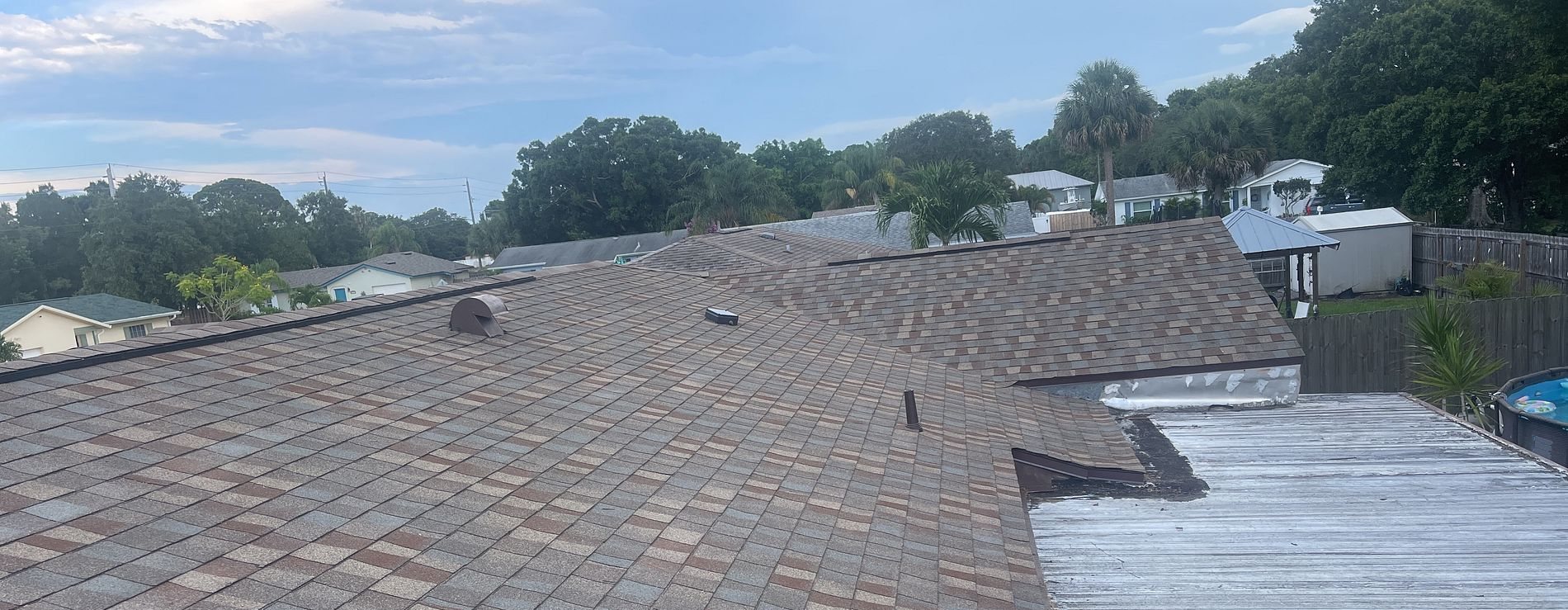 Golden Harvest GAF Timberline HDZ architectural shingle roof installed on a home in Roseland, Florida