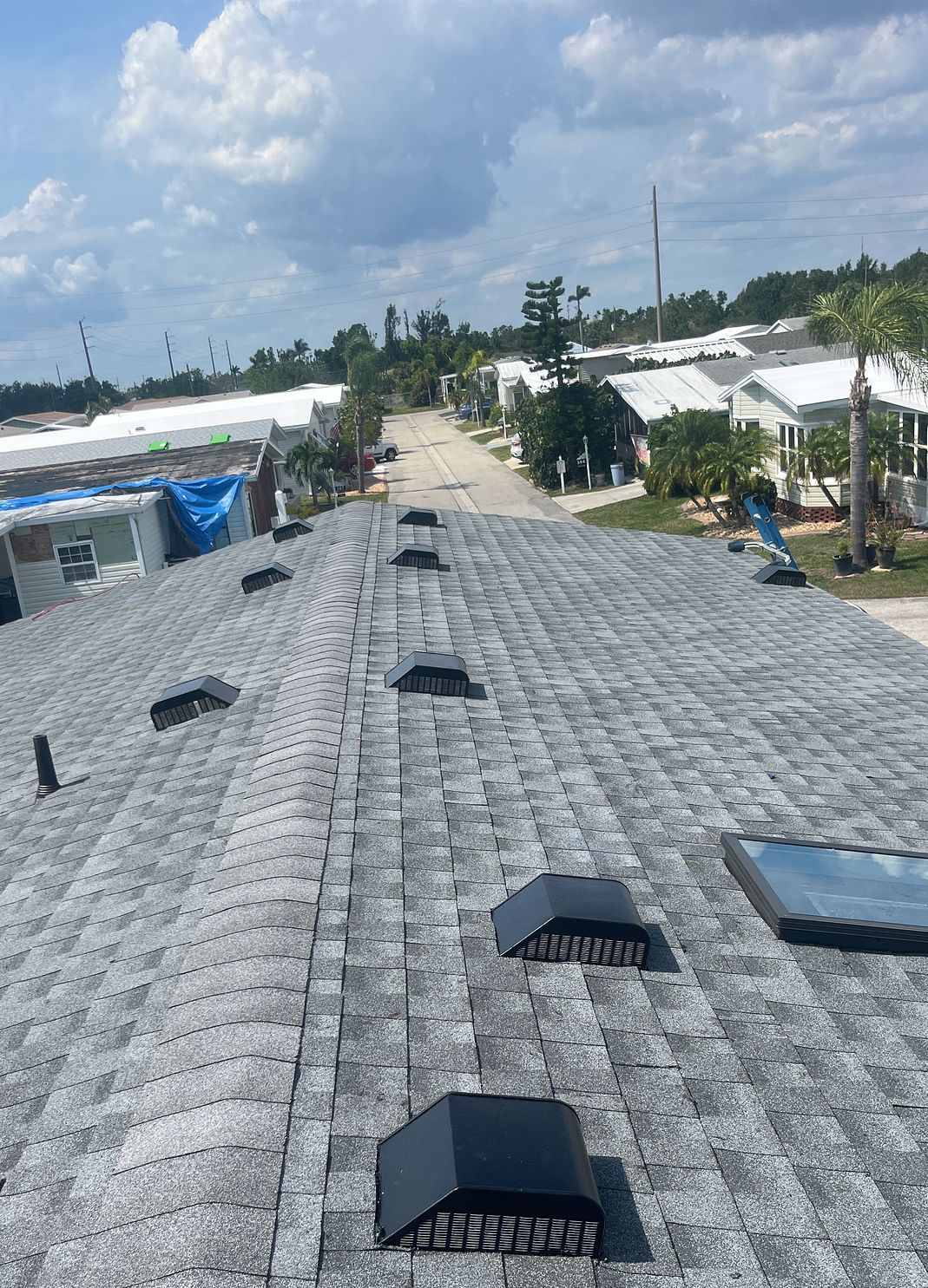 Oyster Gray GAF Timberline HDZ architectural shingle roof installed on a home in Lake Placid, Florida