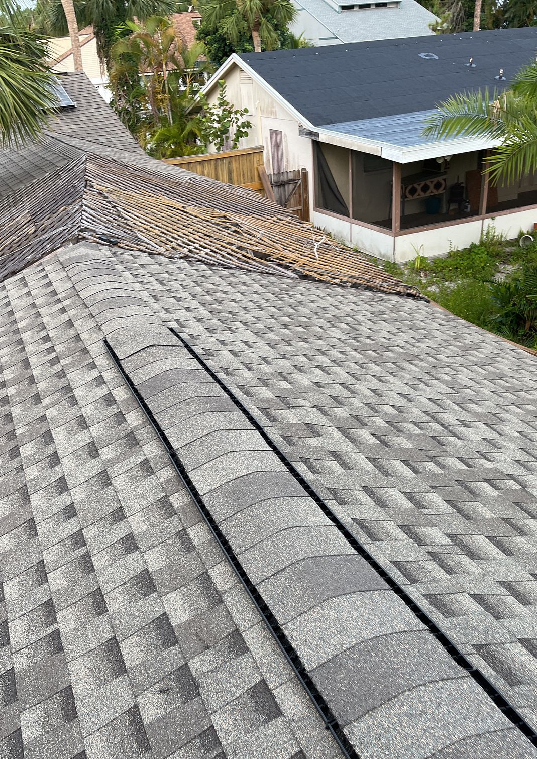 Weathered Wood GAF Timberline HDZ architectural shingle roof installed on a home in Fort Myers, Florida