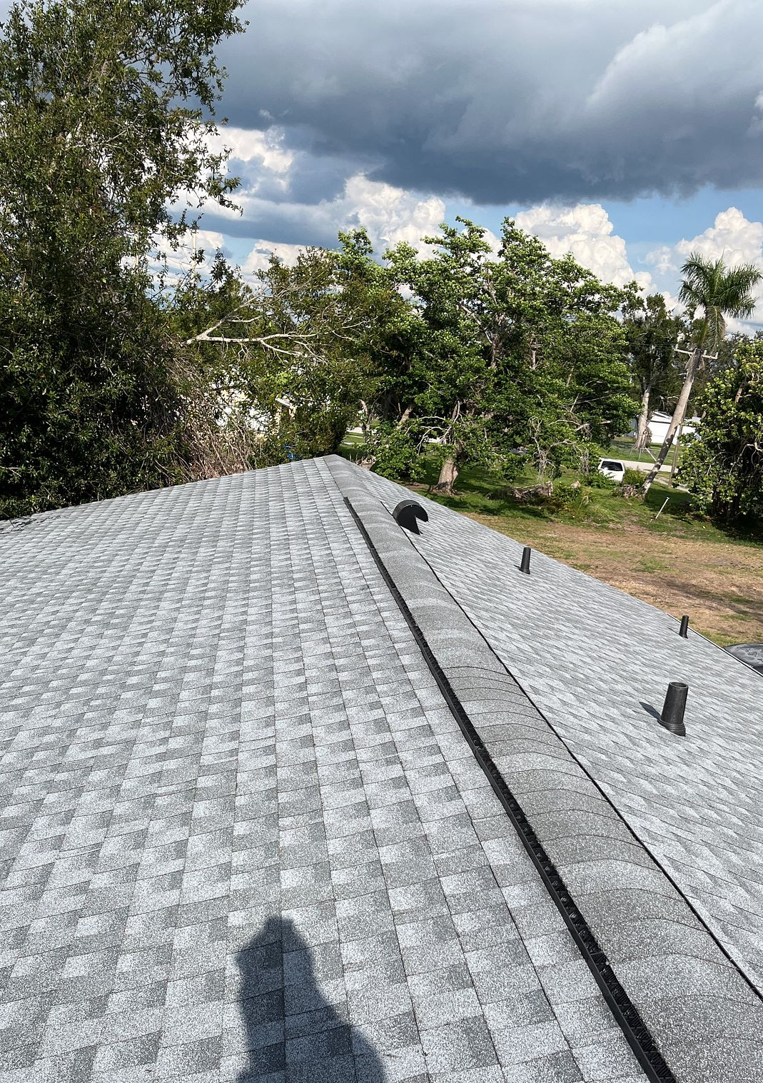 Oyster Gray GAF Timberline HDZ architectural shingle roof installed on a home in Punta Gorda, Florida