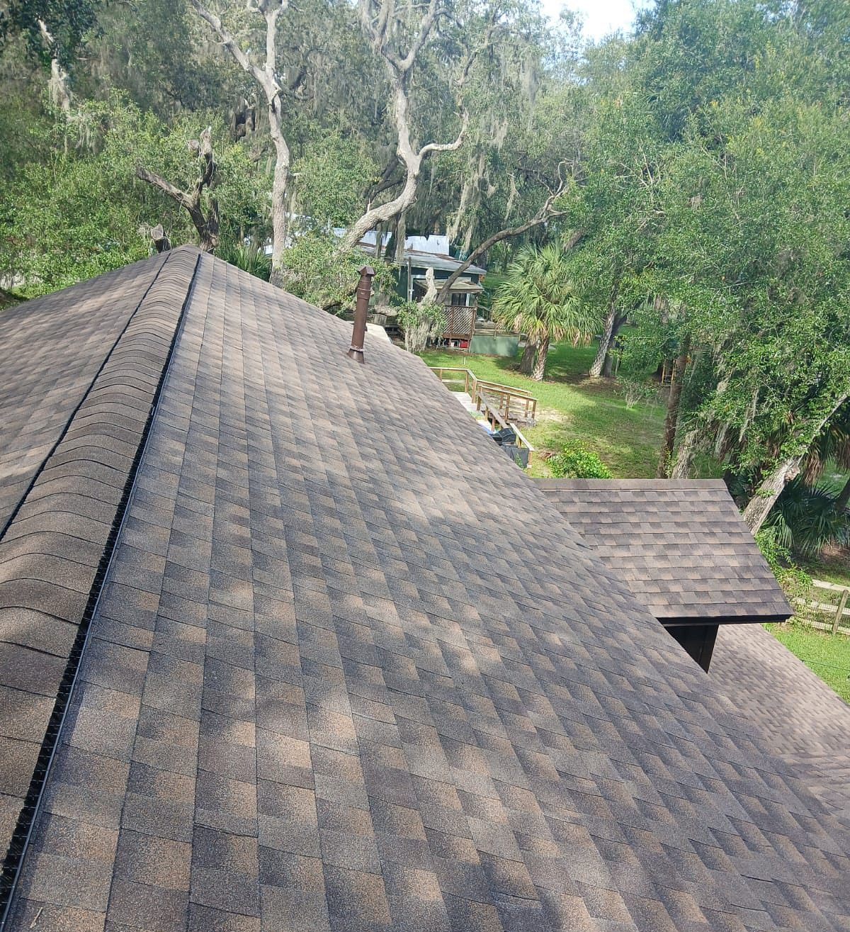 Barkwood GAF Timberline HDZ architectural shingle roof installed on a home in Mayo, Florida