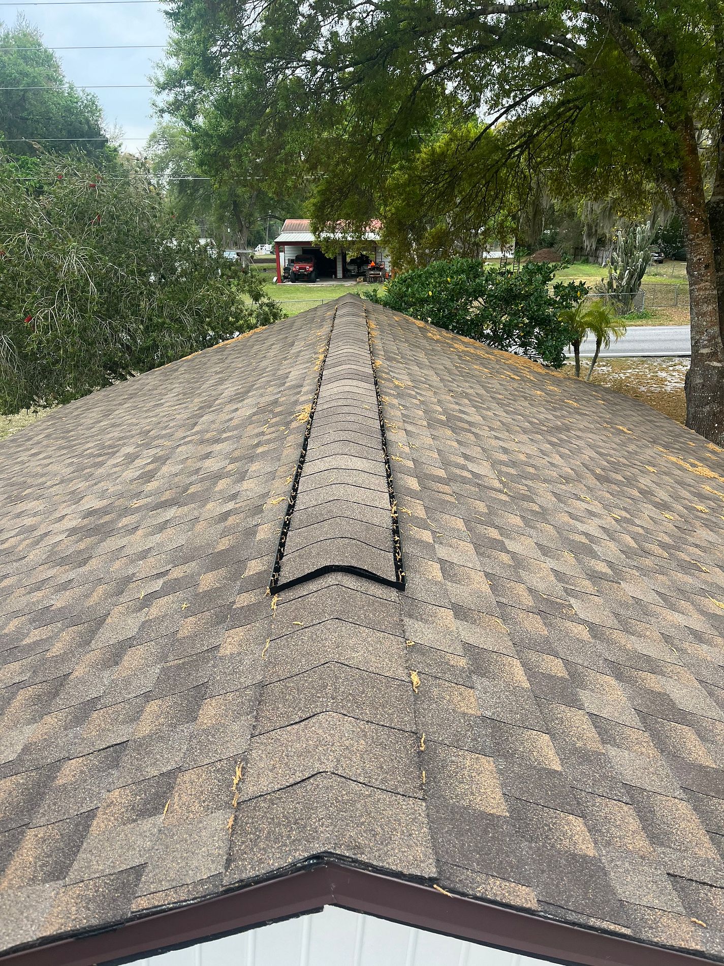 Barkwood GAF Timberline HDZ architectural shingle roof installed on a home in Winter Haven, Florida