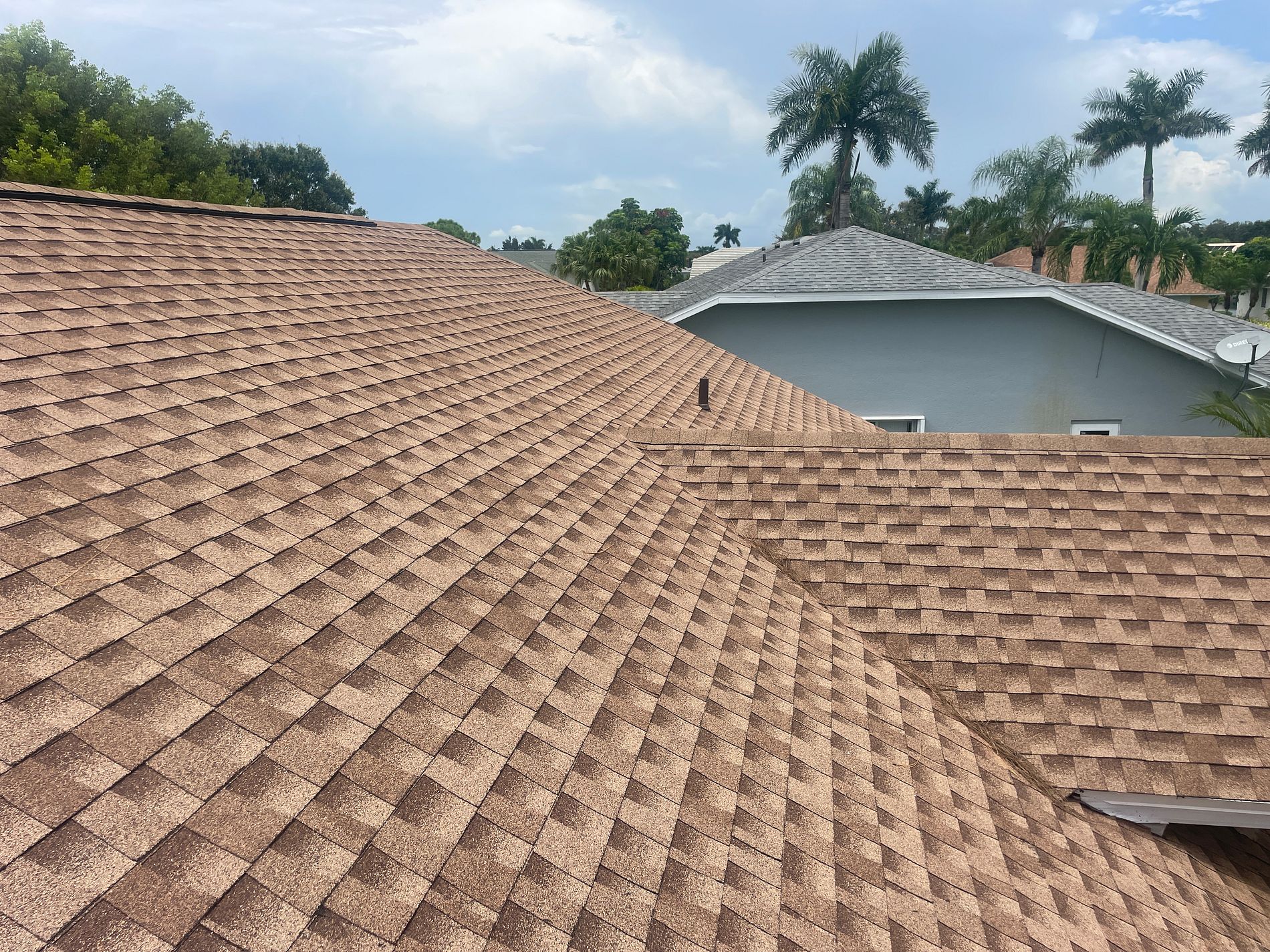 Driftwood GAF Timberline HDZ architectural shingle roof installed on a residential property in Naples, Florida
