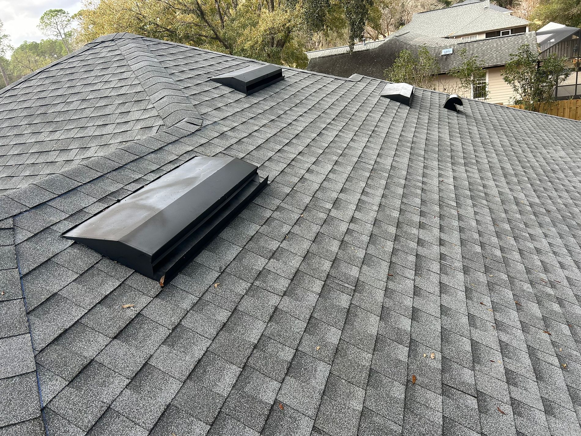 Oyster Gray GAF Timberline HDZ architectural shingle roof installed on a home in Gainesville, Florida