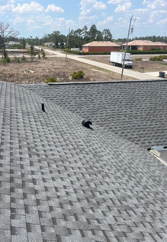 Pewter Gray GAF Timberline HDZ architectural shingle roof installed on a home in LaBelle, Florida