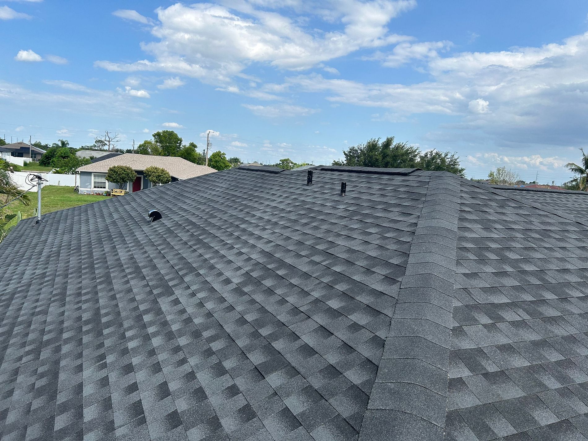 Charcoal GAF Timberline HDZ architectural shingle roof installed on a home in Tarpon Springs, Florida