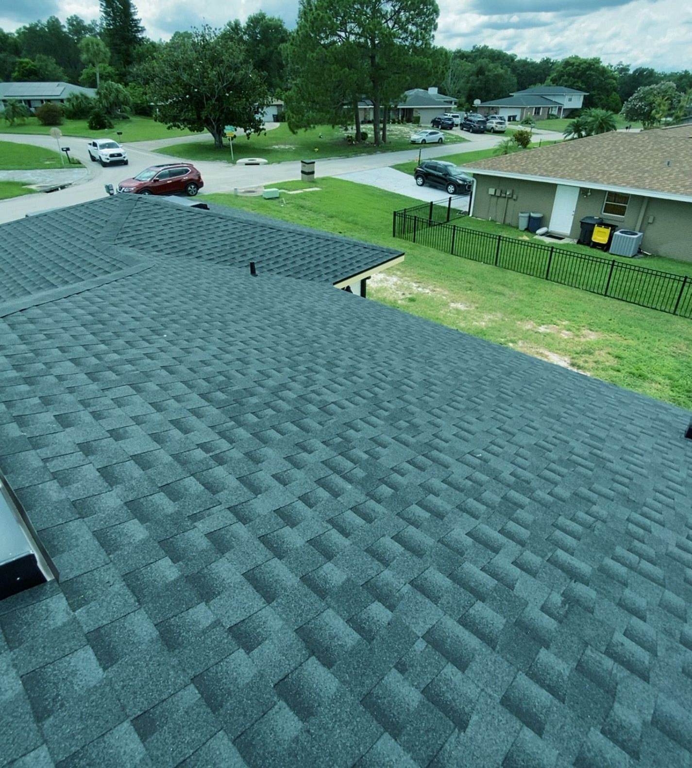 Charcoal GAF Timberline HDZ architectural shingle roof installed on a home in Lakeland, Florida