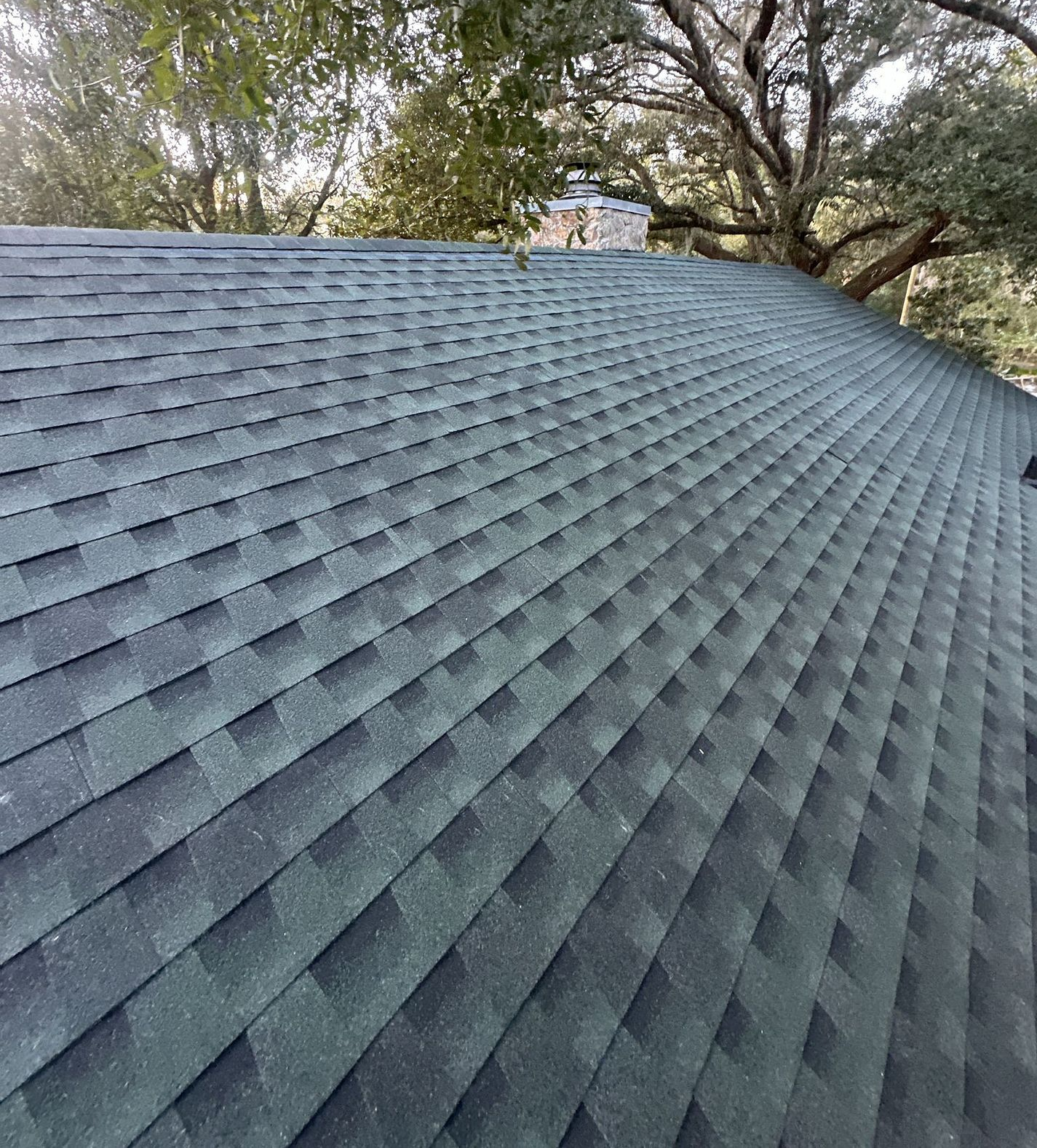 Hunter Green GAF Timberline HDZ architectural shingle roof installed on a home in Mayo, Florida