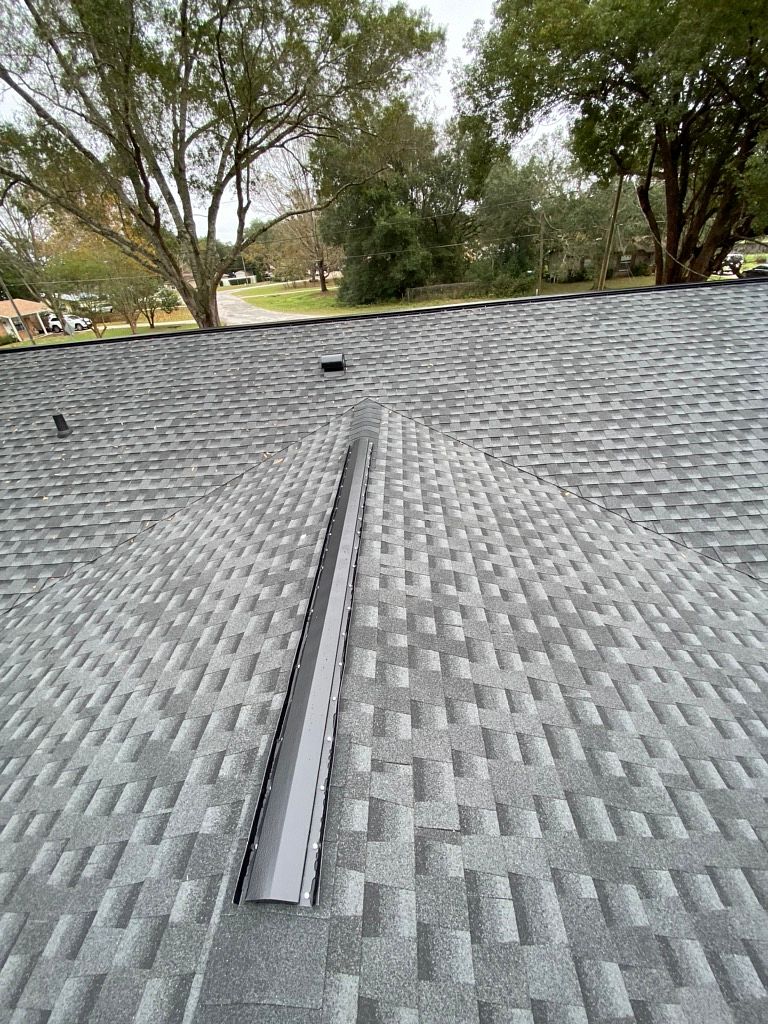 Charcoal GAF Timberline HDZ architectural shingle roof installed on a home in Macclenny, Florida
