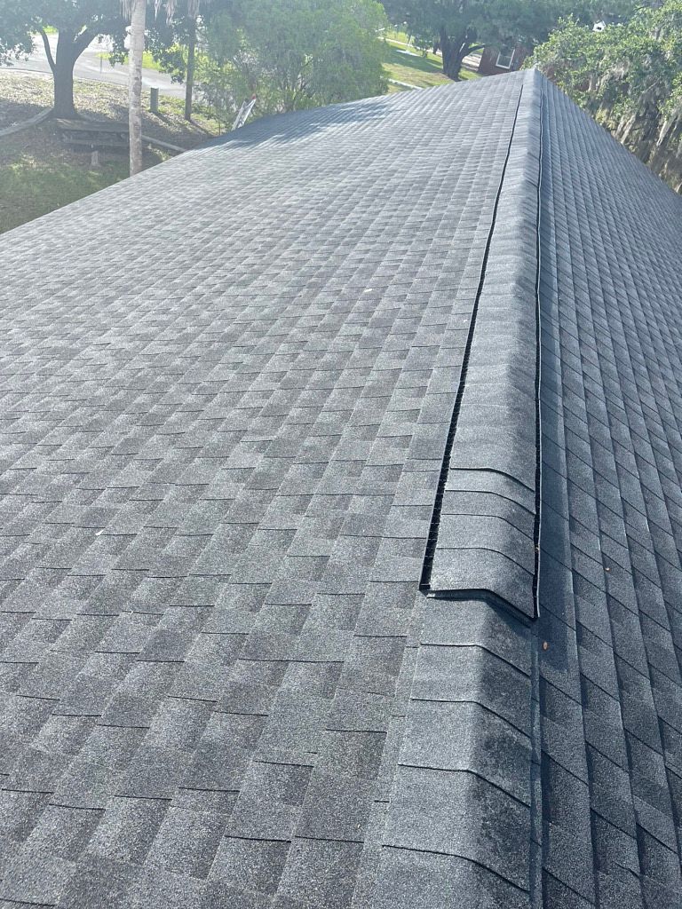 Charcoal GAF Timberline HDZ architectural shingle roof installed on a home in Apalachicola, Florida